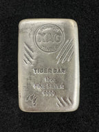10oz Intrinsic Tender Tiger silver cast bar – front