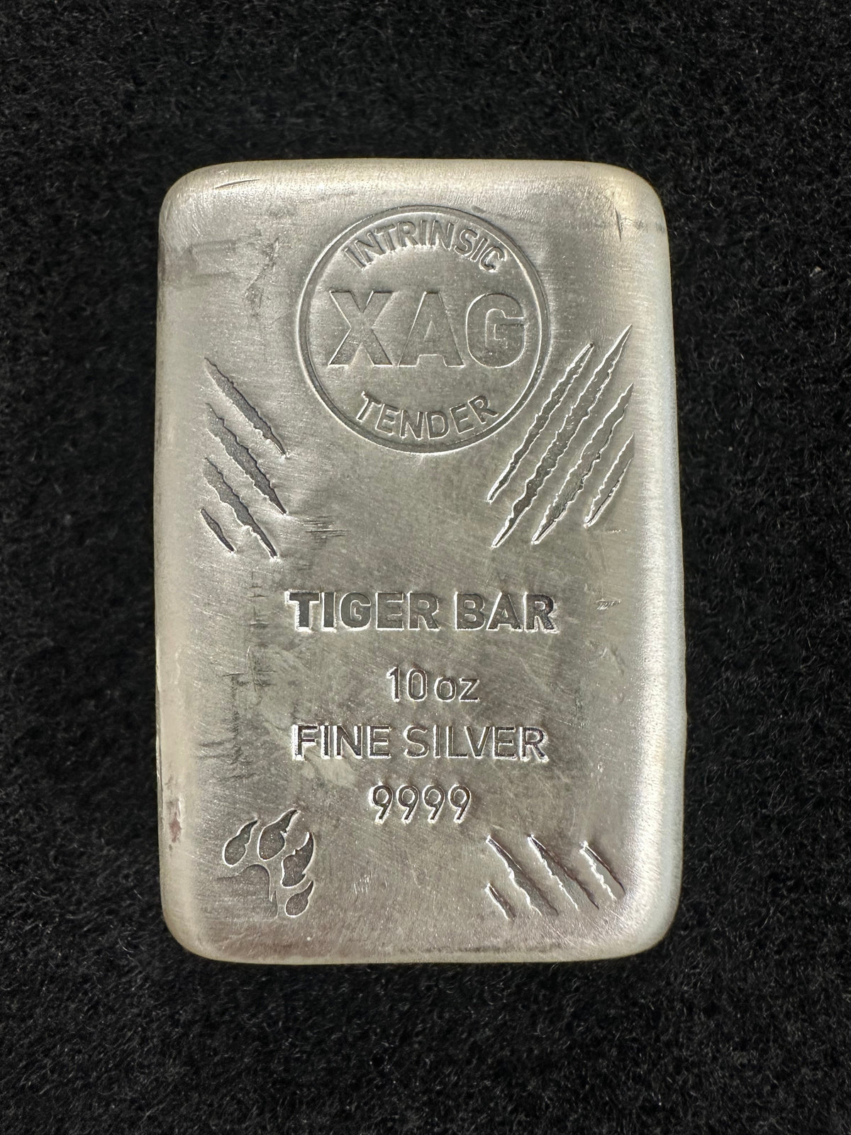 10oz Intrinsic Tender Tiger silver cast bar – front