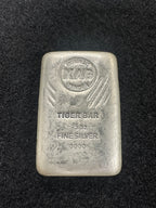 5oz Intrinsic Tender Tiger silver cast bar – front
